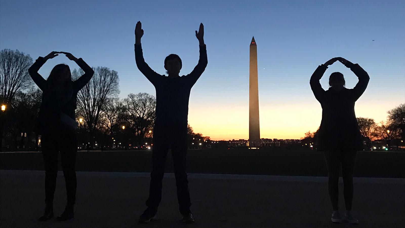 Students giving the O-H-I-O signs in Washington, DC