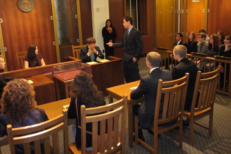Students in mock courtroom setting