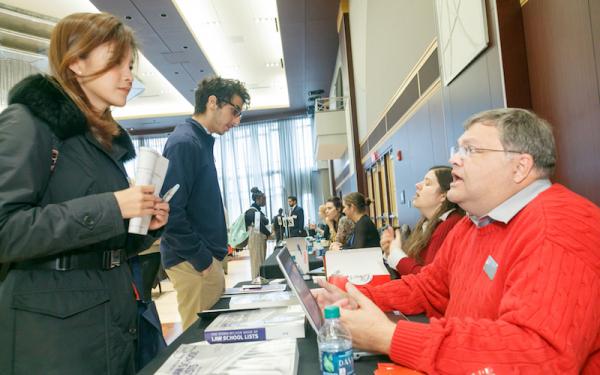 Pre-Law Advisors at the "On the Spot Advising" table at the Law Fair