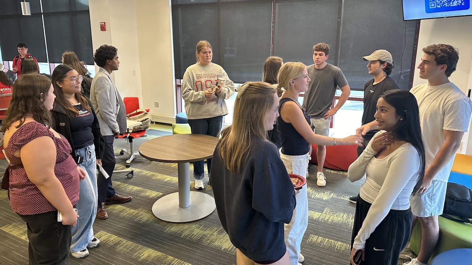 Classroom of students mingling